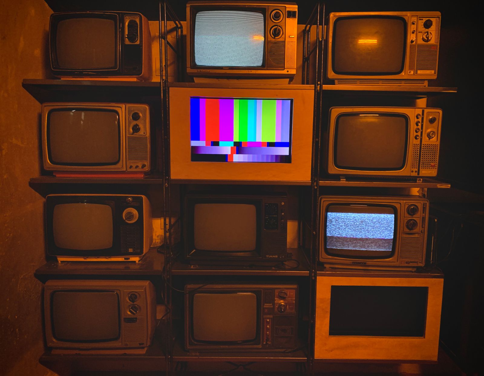 A vintage 1960s television set displaying a scene from the original Star Trek series.