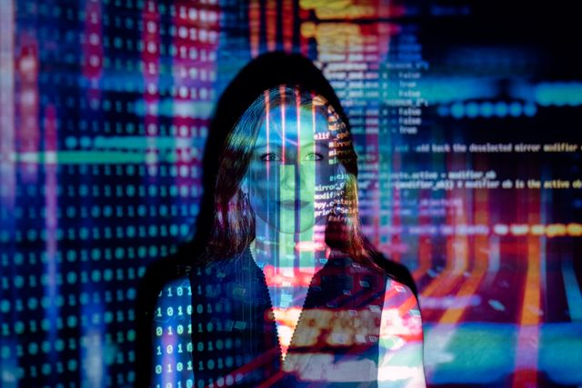 Una mano señalando una pantalla de computadora con gráficos de inteligencia artificial abstractos.
